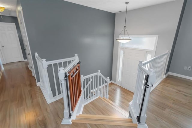 147 Midland Dr, Stockbridge, GA 30281 - stairs with wood finished floors and baseboards