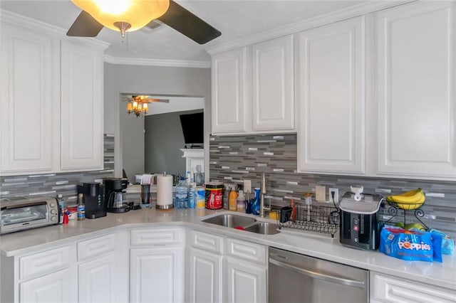 147 Midland Dr, Stockbridge, GA 30281 - kitchen featuring stainless steel dishwasher, ceiling fan, backsplash, white cabinets, and ornamental molding