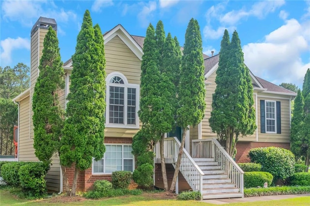 147 Midland Dr, Stockbridge, GA 30281 - view of front of property with a chimney and brick siding