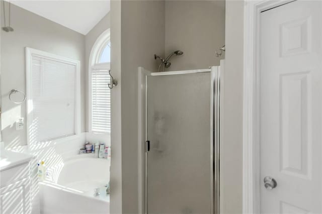147 Midland Dr, Stockbridge, GA 30281 - bathroom with a shower stall, a garden tub, and vanity