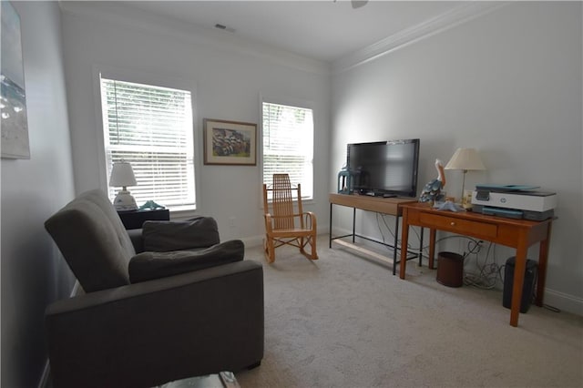 carpeted living room featuring crown molding