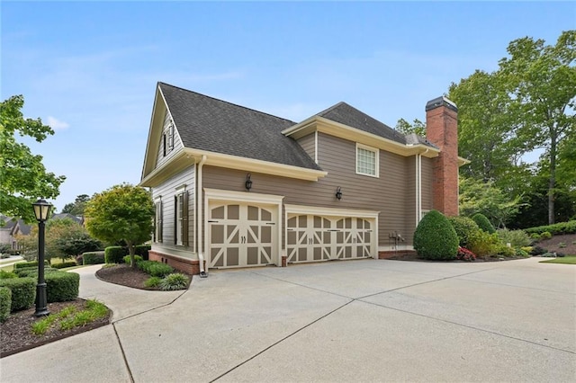 view of property exterior featuring a garage