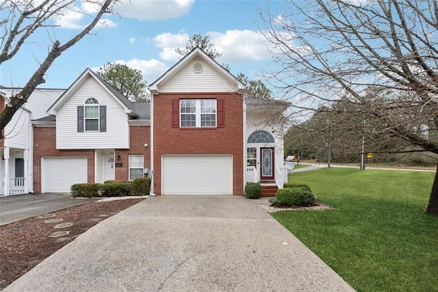 view of front of home featuring a front yard and a garage