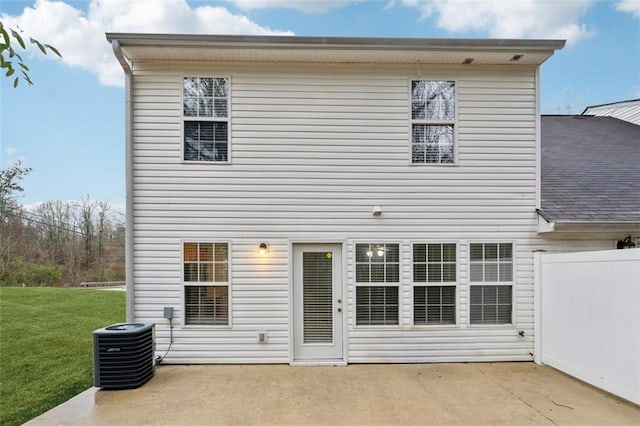 back of house featuring central air condition unit and a patio area