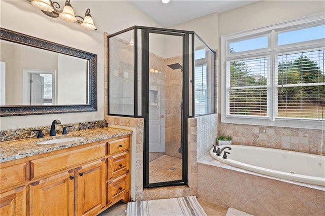 5955 Manchester Ln, Gainesville, GA 30506 - bathroom with a garden tub, plenty of natural light, a shower stall, and vanity