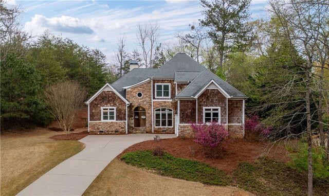 5955 Manchester Ln, Gainesville, GA 30506 - view of front of home featuring stone siding, driveway, a garage, and crawl space