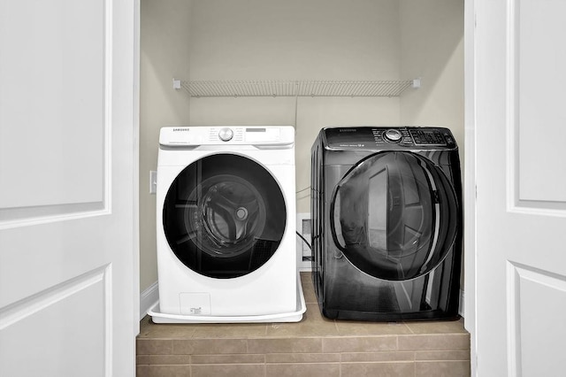 laundry room featuring laundry area and independent washer and dryer