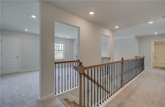 2516 Cadenza Cir, Dacula, GA 30019 - hall with carpet flooring, an upstairs landing, and recessed lighting