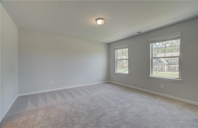 2516 Cadenza Cir, Dacula, GA 30019 - empty room featuring carpet and baseboards