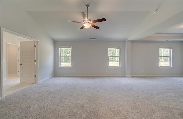 2516 Cadenza Cir, Dacula, GA 30019 - carpeted spare room featuring healthy amount of natural light, ceiling fan, and vaulted ceiling