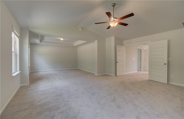 2516 Cadenza Cir, Dacula, GA 30019 - empty room featuring ceiling fan, light colored carpet, and vaulted ceiling