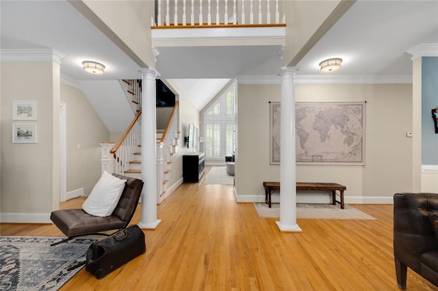530 Twinflower Ct, Roswell, GA 30075 - entrance foyer with ornate columns, light wood-style floors, baseboards, and stairway