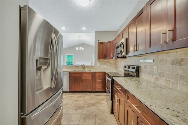 5600 Walnut Creek Ct NW, Lilburn, GA 30047 - kitchen with appliances with stainless steel finishes, a sink, tasteful backsplash, a chandelier, and light stone counters