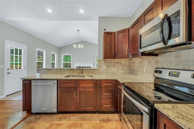 5600 Walnut Creek Ct NW, Lilburn, GA 30047 - kitchen featuring appliances with stainless steel finishes, a sink, vaulted ceiling, a chandelier, and backsplash