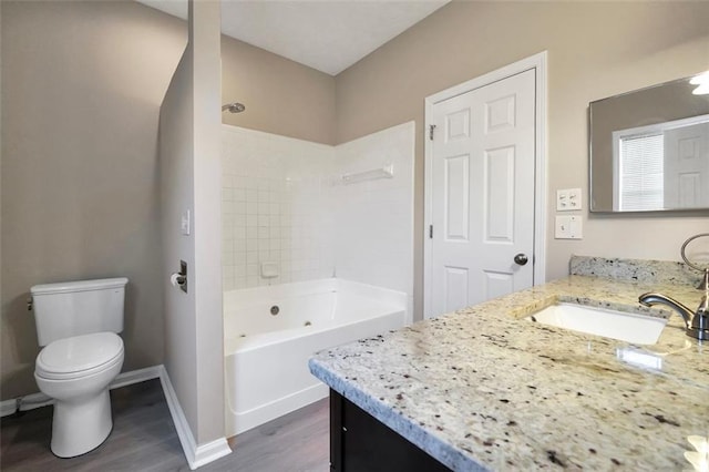 5600 Walnut Creek Ct NW, Lilburn, GA 30047 - bathroom with vanity, wood finished floors, toilet, and baseboards