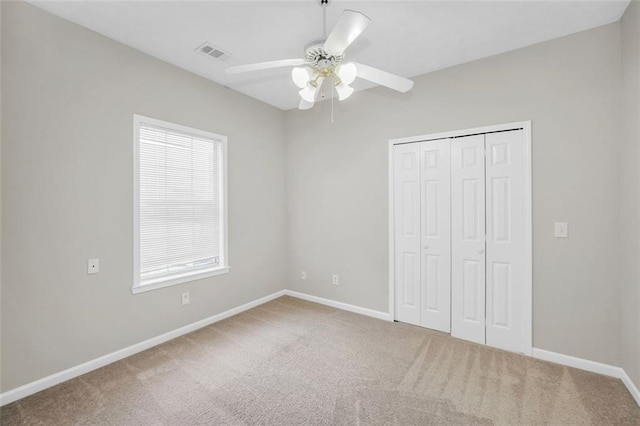 5600 Walnut Creek Ct NW, Lilburn, GA 30047 - unfurnished bedroom with carpet, baseboards, and a closet