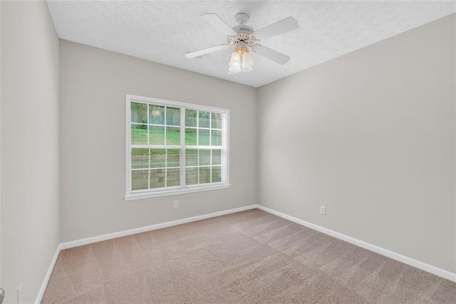 5600 Walnut Creek Ct NW, Lilburn, GA 30047 - carpeted empty room featuring baseboards, a textured ceiling, and ceiling fan