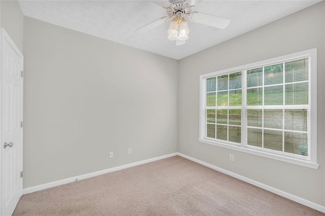 5600 Walnut Creek Ct NW, Lilburn, GA 30047 - carpeted spare room with baseboards and a ceiling fan