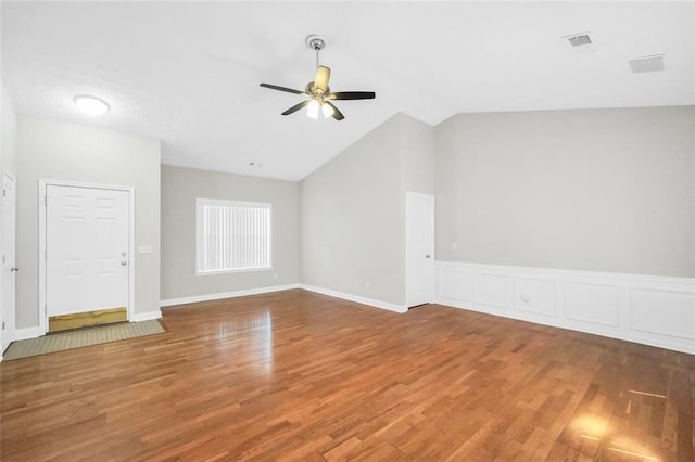 5600 Walnut Creek Ct NW, Lilburn, GA 30047 - unfurnished room featuring ceiling fan, vaulted ceiling, and wood finished floors
