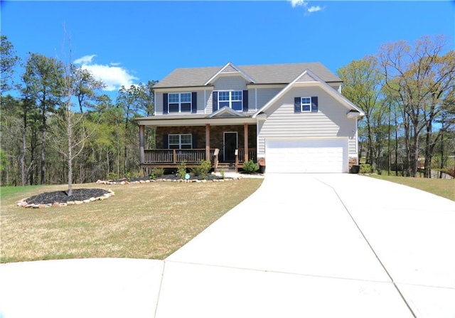 craftsman house featuring a front lawn, a garage, and a porch