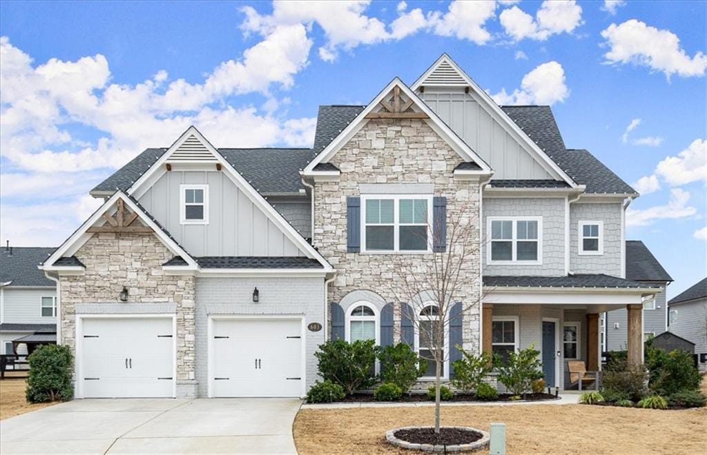 craftsman house featuring a garage