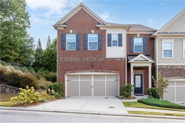 view of front of home with a garage