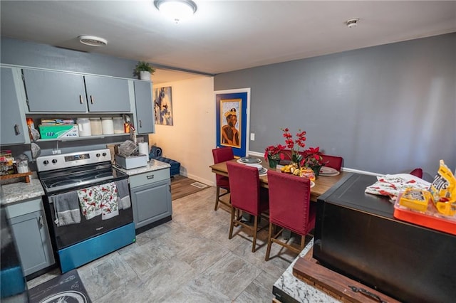 kitchen featuring stainless steel electric range