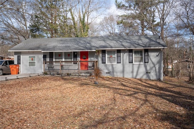 ranch-style home featuring covered porch