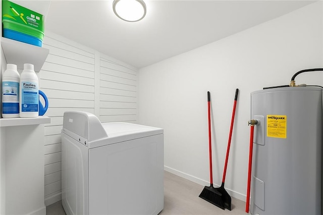 5150 Wheat St NE, Covington, GA 30014 - laundry area featuring water heater, baseboards, and separate washer and dryer