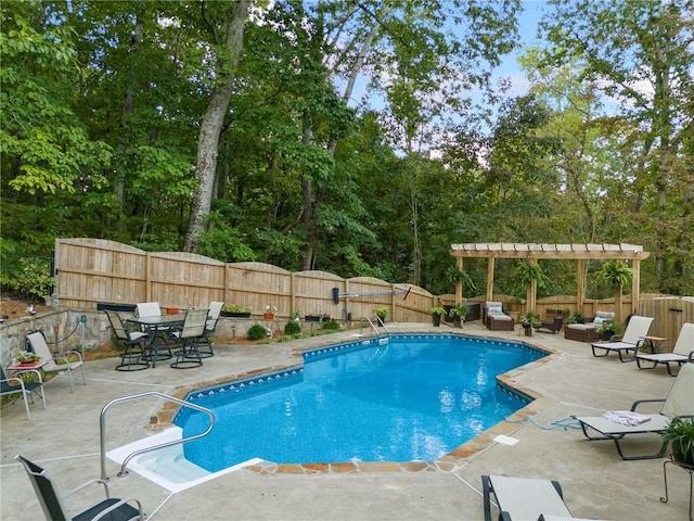 view of swimming pool featuring a patio area, a fenced in pool, a fenced backyard, and a pergola