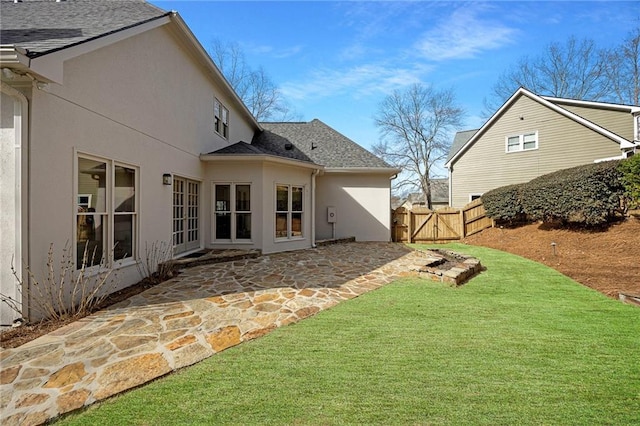 view of yard featuring a patio area and fence