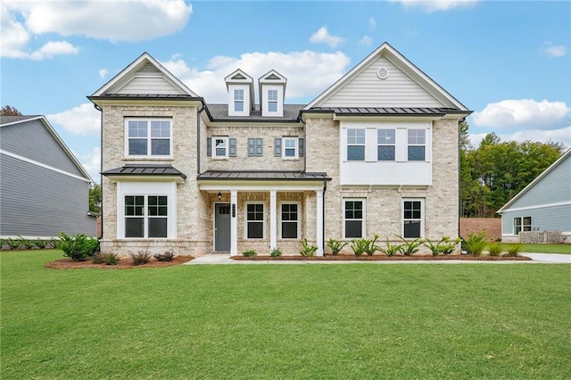 view of front of home with a front lawn