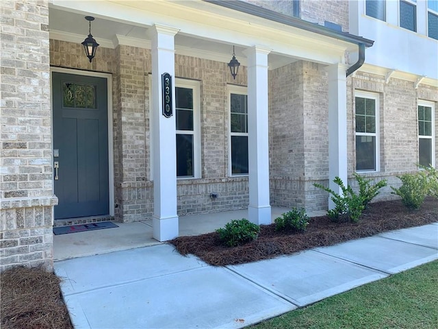 doorway to property with covered porch