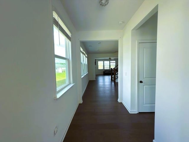 4935 Bellehurst Ln, Cumming, GA 30040 - hall featuring baseboards and dark wood-type flooring
