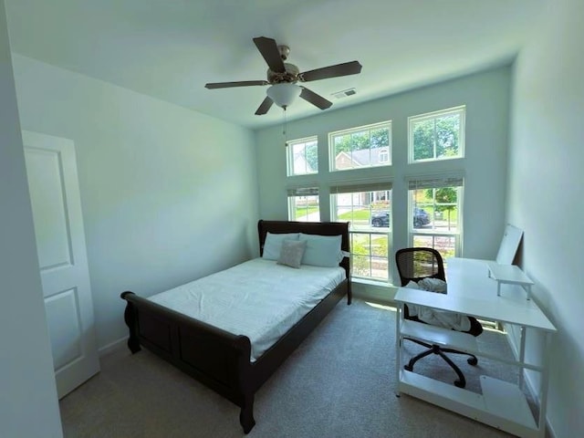 4935 Bellehurst Ln, Cumming, GA 30040 - carpeted bedroom with an office area and ceiling fan