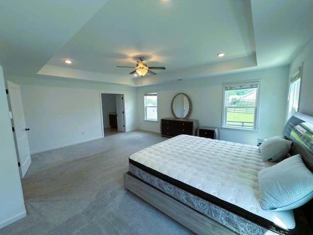 4935 Bellehurst Ln, Cumming, GA 30040 - carpeted bedroom featuring a tray ceiling, baseboards, recessed lighting, and ceiling fan
