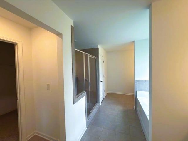 4935 Bellehurst Ln, Cumming, GA 30040 - corridor featuring baseboards and tile patterned floors