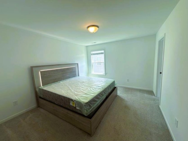 4935 Bellehurst Ln, Cumming, GA 30040 - carpeted bedroom featuring baseboards