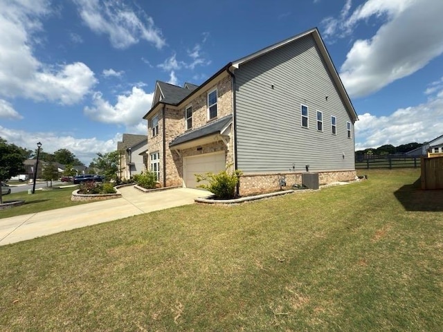 4935 Bellehurst Ln, Cumming, GA 30040 - view of side of property with an attached garage, driveway, central AC, and brick siding