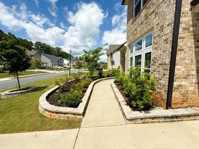 4935 Bellehurst Ln, Cumming, GA 30040 - surrounding community with a yard and a residential view