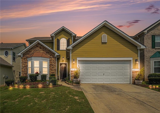 7761 Parkside Dr, Lithia Springs, GA 30122 - traditional-style house featuring concrete driveway, stone siding, and a front lawn