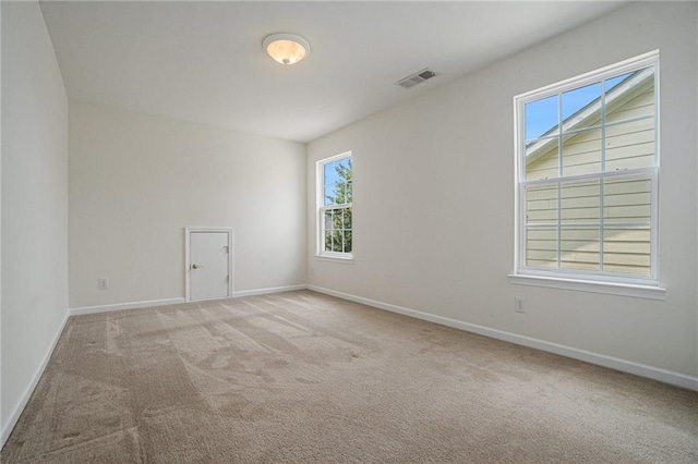 7761 Parkside Dr, Lithia Springs, GA 30122 - carpeted spare room featuring baseboards