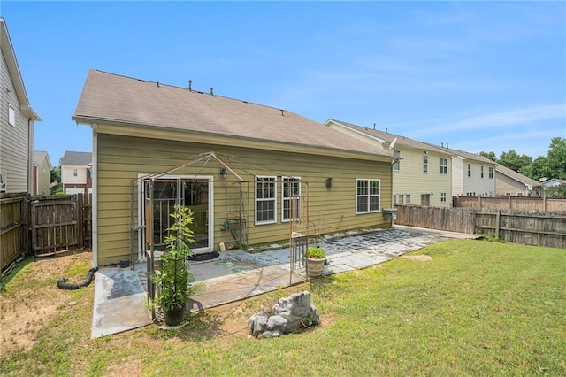 7761 Parkside Dr, Lithia Springs, GA 30122 - rear view of property featuring a patio area