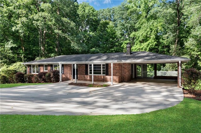 single story home with a carport