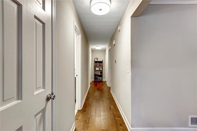 537 Raven Springs Trl, Stone Mountain, GA 30087 - hallway featuring hardwood / wood-style flooring and baseboards