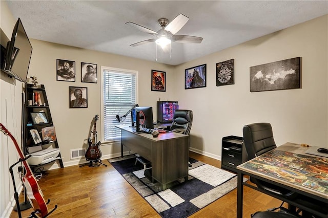 537 Raven Springs Trl, Stone Mountain, GA 30087 - home office with a ceiling fan and wood finished floors