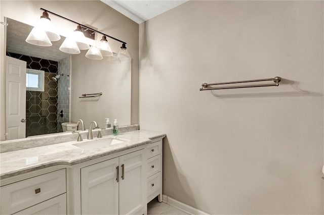 537 Raven Springs Trl, Stone Mountain, GA 30087 - bathroom featuring a tile shower and vanity