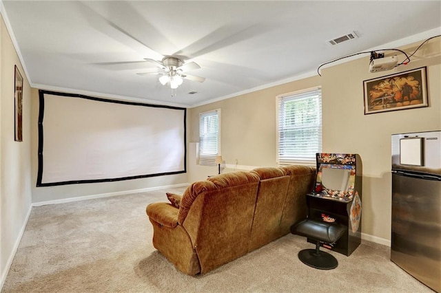 537 Raven Springs Trl, Stone Mountain, GA 30087 - cinema room featuring crown molding, carpet flooring, and a ceiling fan