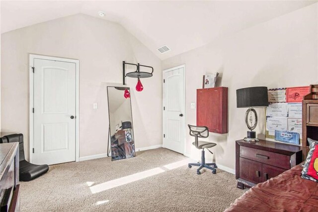 carpeted bedroom featuring vaulted ceiling