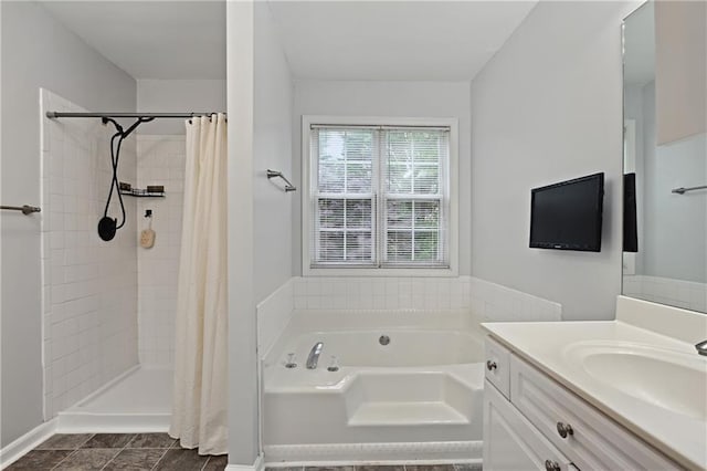 1185 Charter Club Dr, Lawrenceville, GA 30043 - bathroom with vanity, a bath, tiled shower, and baseboards